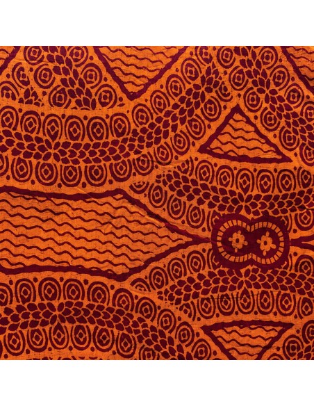 Tissu wax orange cuivré et bordeaux - motifs spirales et triangles
