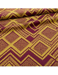 Tissu wax bordeaux et jaune doré à motifs graphiques