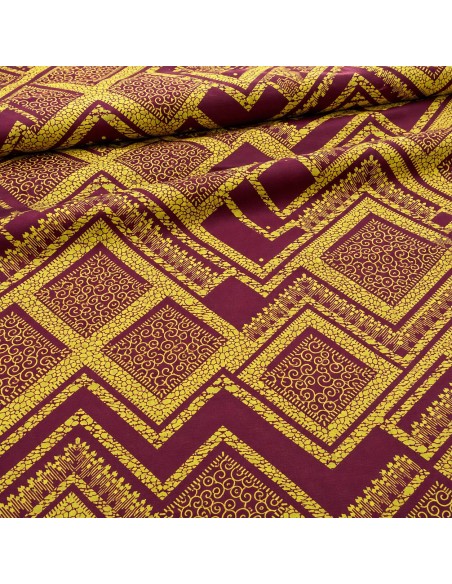 Tissu wax bordeaux et jaune doré à motifs graphiques